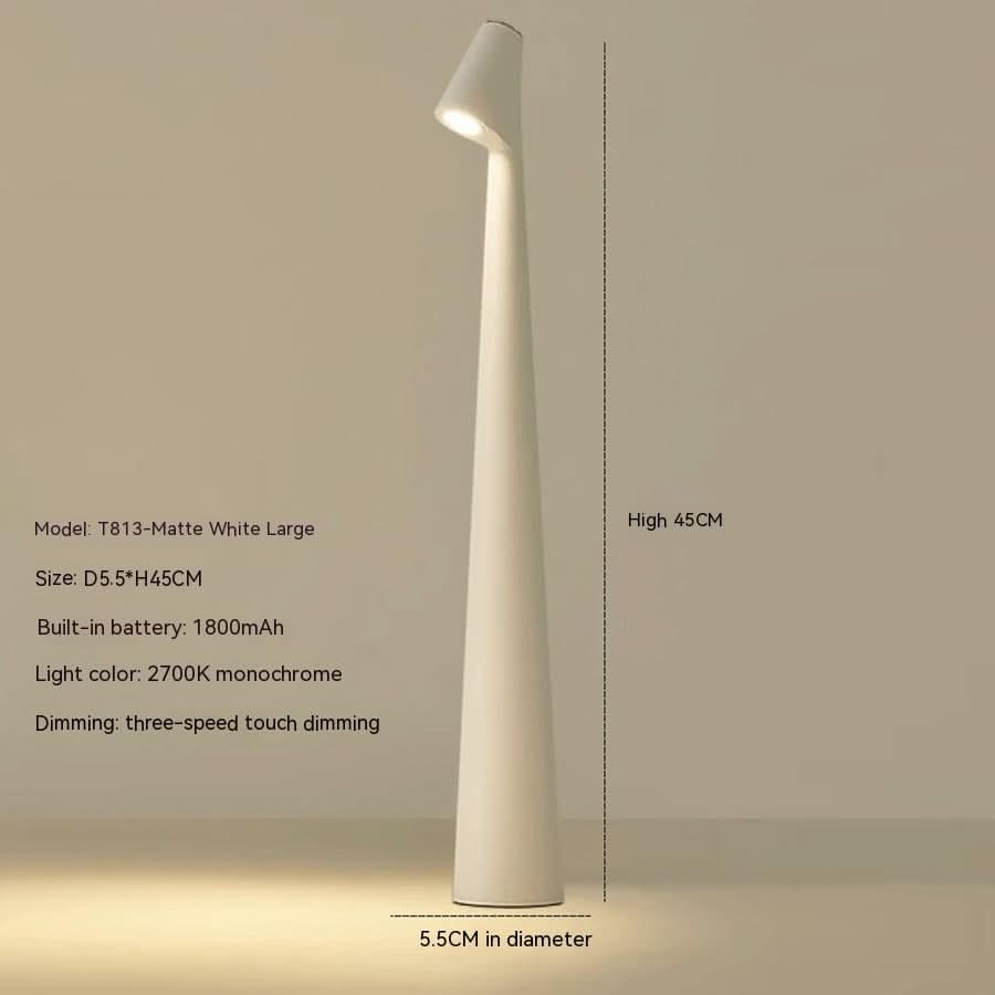 Genopladelig bordlampe i metal — stilfuldt ledningsfrit stemningslys