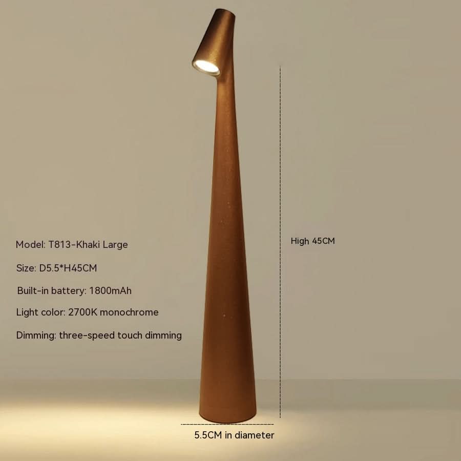 Genopladelig bordlampe i metal — stilfuldt ledningsfrit stemningslys