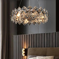 Elegant LED-krystallkrone med røykfargede ringer til soverommet | livraina