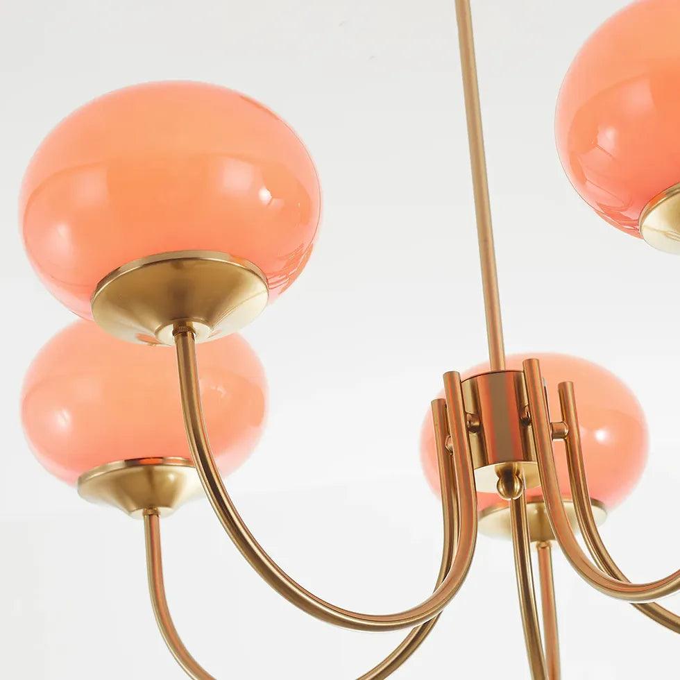 Gouden hanglamp met glazen takdesign in crème en roze | livraina
