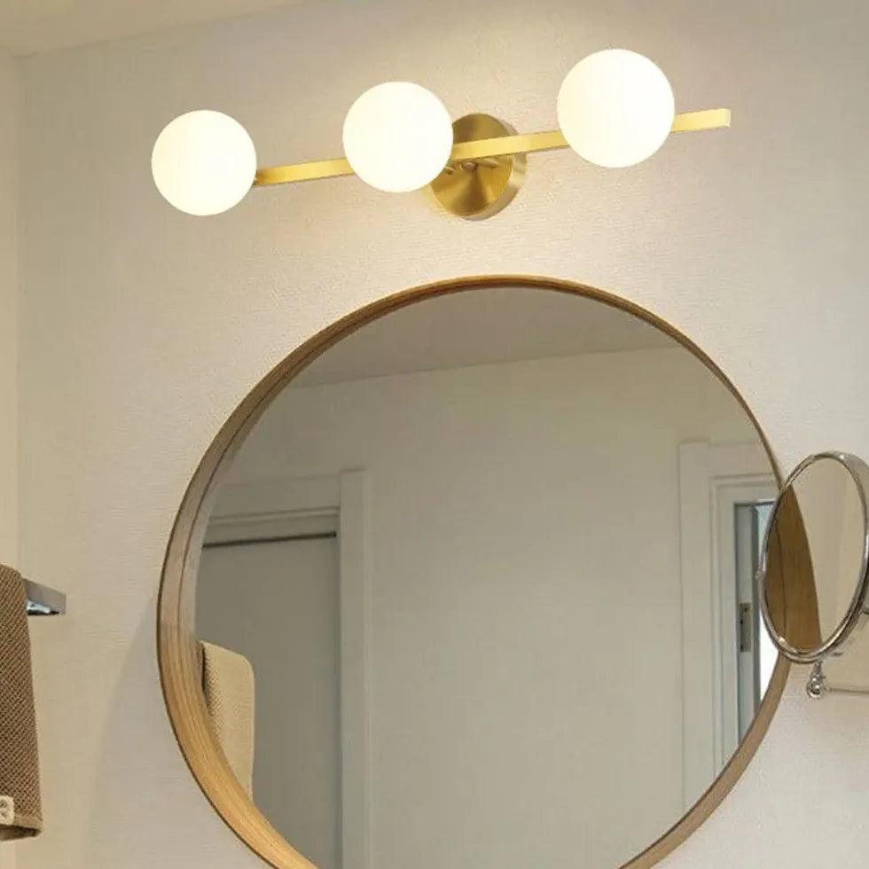 Moderne goldene Wandleuchten für den Badspiegel | livraina