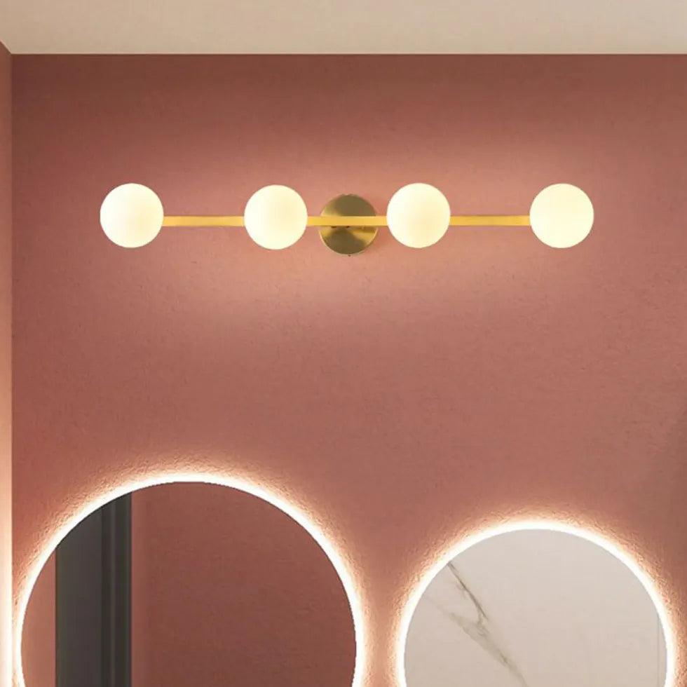 Moderne goldene Wandleuchten für den Badspiegel | livraina